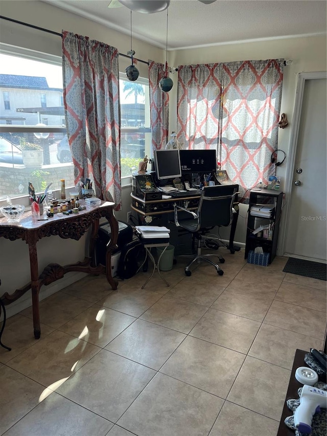 tiled home office featuring a wealth of natural light