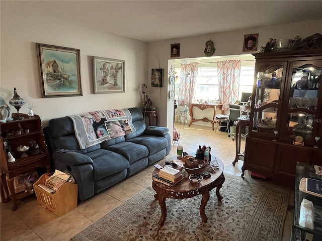 living room with light tile patterned floors