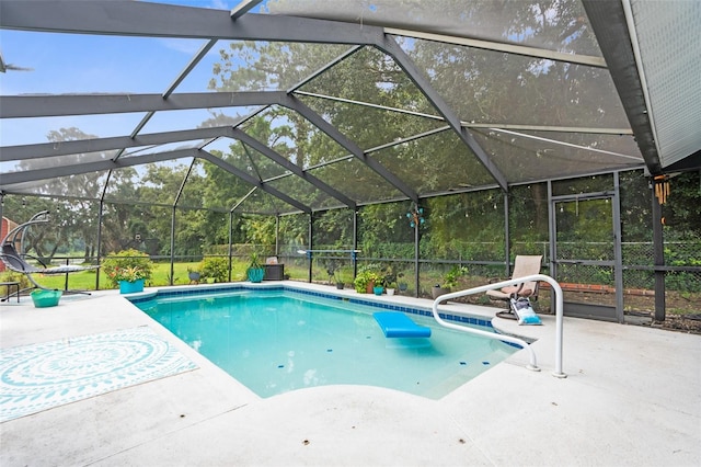 view of pool featuring a lanai and a patio area