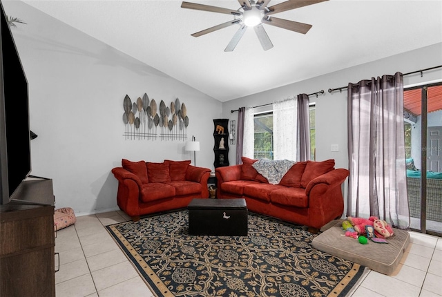 tiled living room with lofted ceiling and ceiling fan