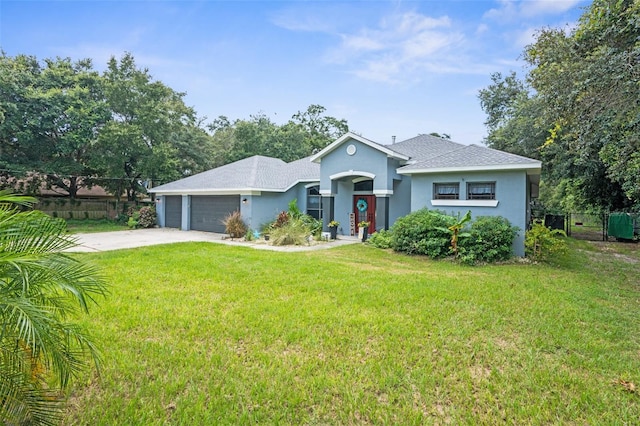 ranch-style home with a front yard and a garage