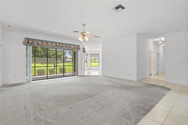 unfurnished living room with ceiling fan and light tile patterned flooring