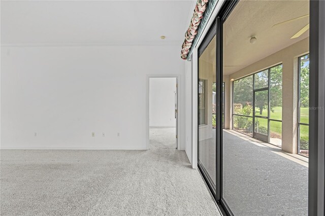 interior space featuring ceiling fan