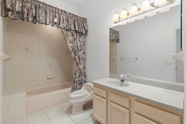 full bathroom featuring shower / bathtub combination with curtain, vanity, tile patterned flooring, and toilet