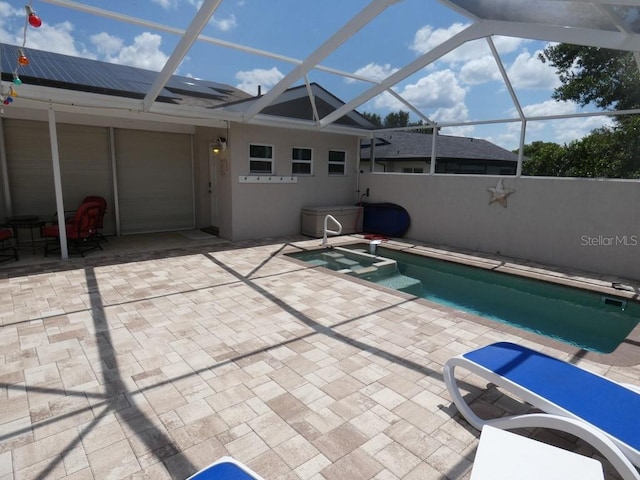 view of pool featuring a patio and a lanai