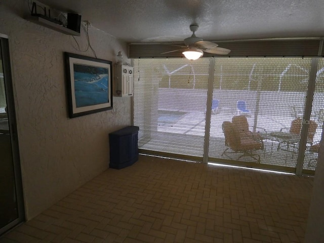 spare room with ceiling fan