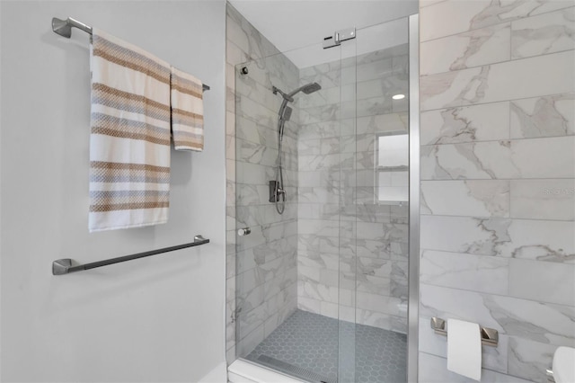 bathroom featuring an enclosed shower