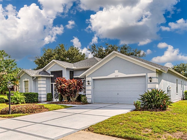 single story home featuring a front yard and a garage