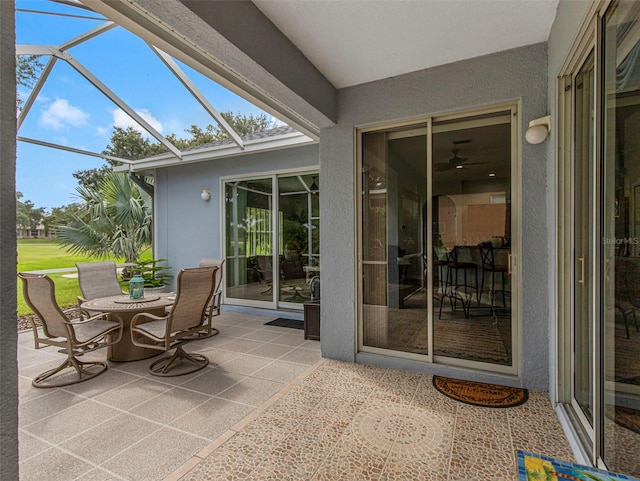 view of patio / terrace with a lanai