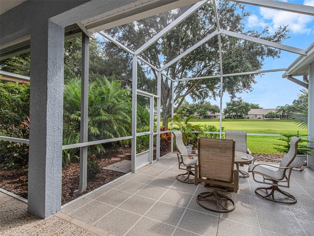 sunroom featuring a healthy amount of sunlight