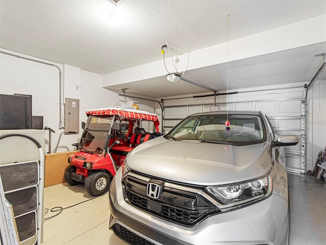 garage with electric panel and a garage door opener