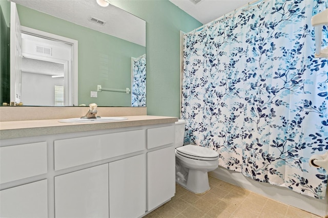 bathroom with toilet, shower / bath combination with curtain, vanity, and visible vents