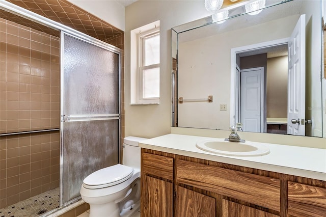 6316 Spoonbill Dr, New Port Richey, FL 34652 - bathroom featuring a shower stall, toilet, and vanity
