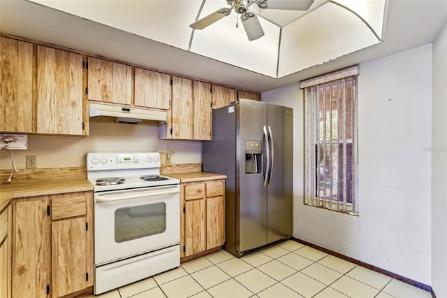 kitchen with ceiling fan, stainless steel fridge, light tile patterned floors, and electric stove