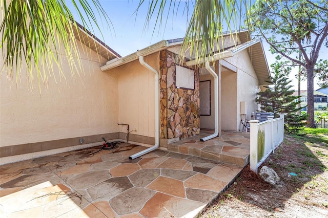 view of property exterior featuring a patio