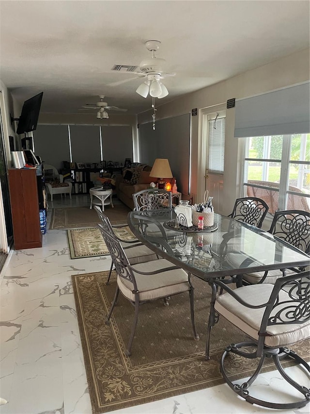 dining area featuring ceiling fan