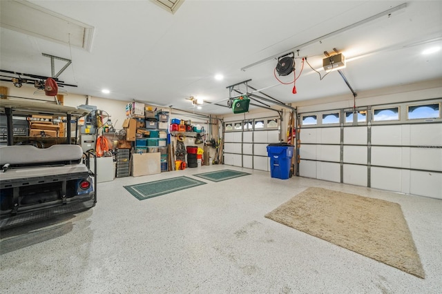 garage featuring a garage door opener