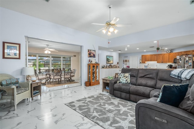 living room featuring ceiling fan