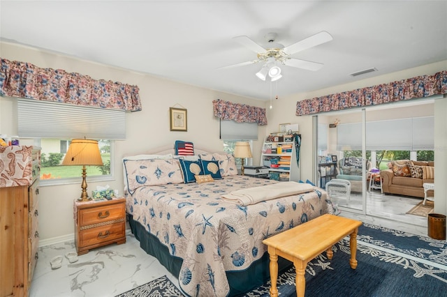 bedroom featuring access to outside and ceiling fan