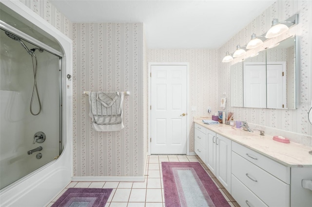 bathroom featuring vanity, enclosed tub / shower combo, and tile patterned floors