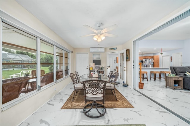 sunroom / solarium featuring a wall unit AC and ceiling fan