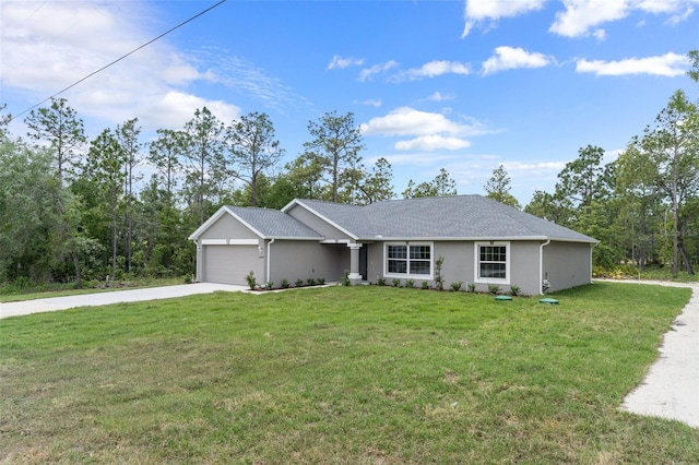 ranch-style home featuring a front lawn and a garage