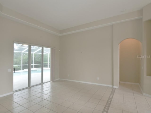 empty room featuring light tile patterned floors