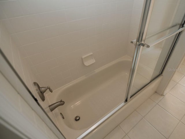 bathroom with tile patterned floors