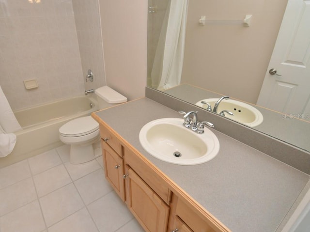 full bathroom featuring shower / bath combo, toilet, tile patterned floors, and vanity