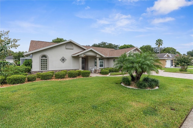 ranch-style house with a front yard