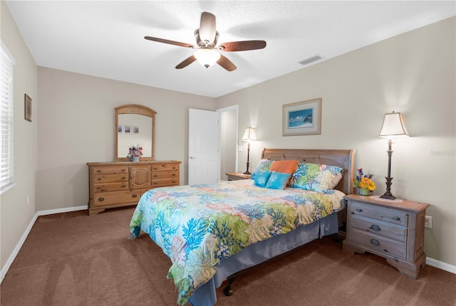 bedroom featuring carpet flooring, ceiling fan, and multiple windows