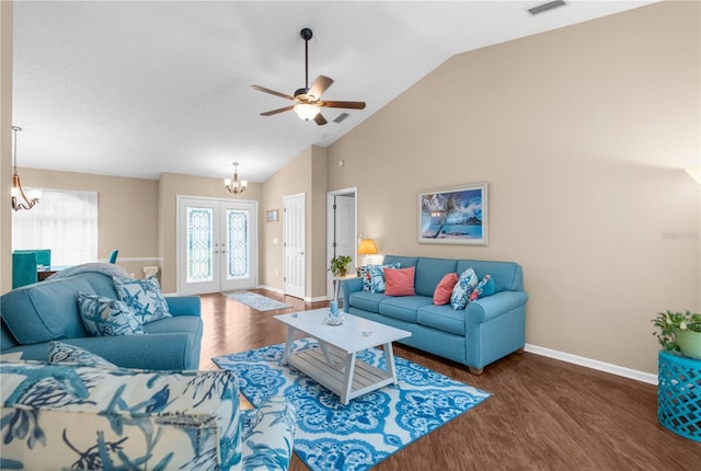 living room featuring high vaulted ceiling, ceiling fan with notable chandelier, and dark wood-type flooring