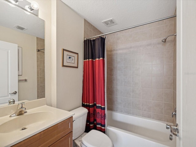 full bathroom featuring a textured ceiling, vanity, toilet, and shower / bathtub combination with curtain