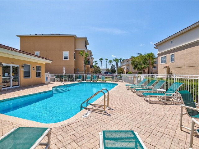 view of swimming pool featuring a patio