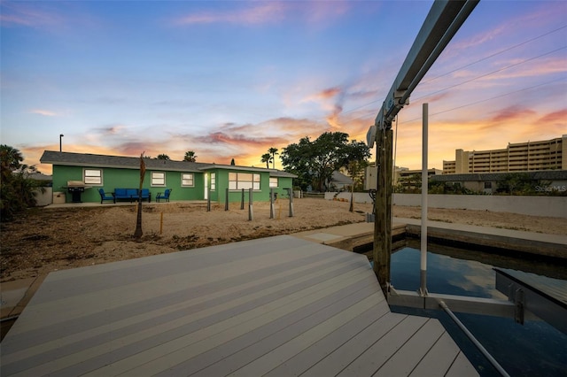 view of dock with a wooden deck