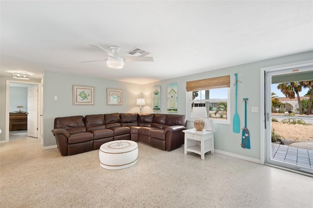 living room with ceiling fan