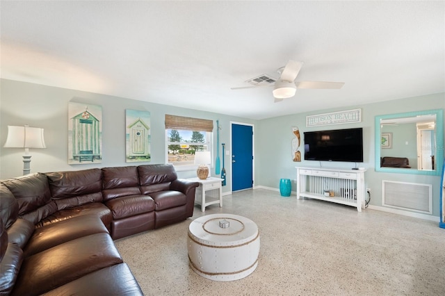 living room featuring ceiling fan