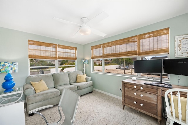 living room with ceiling fan