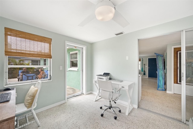 office area featuring ceiling fan and plenty of natural light