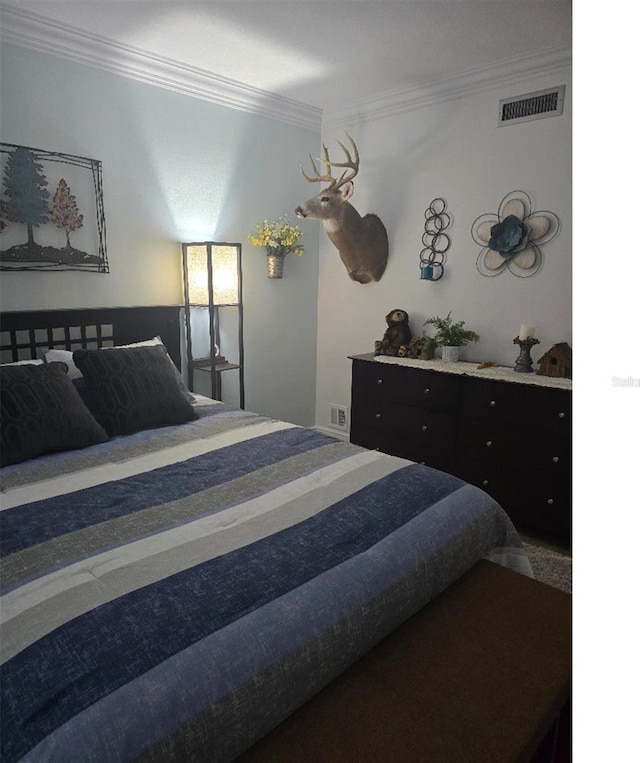 bedroom with ornamental molding