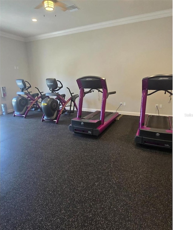 exercise room featuring ornamental molding and ceiling fan