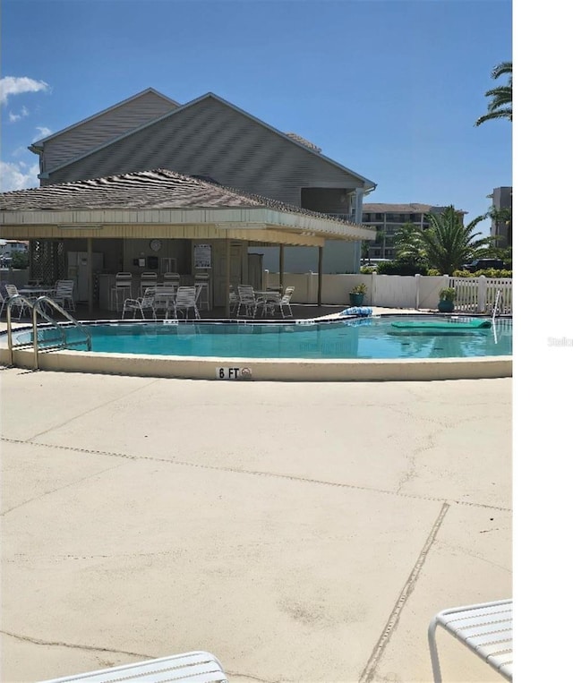 view of pool featuring a patio area