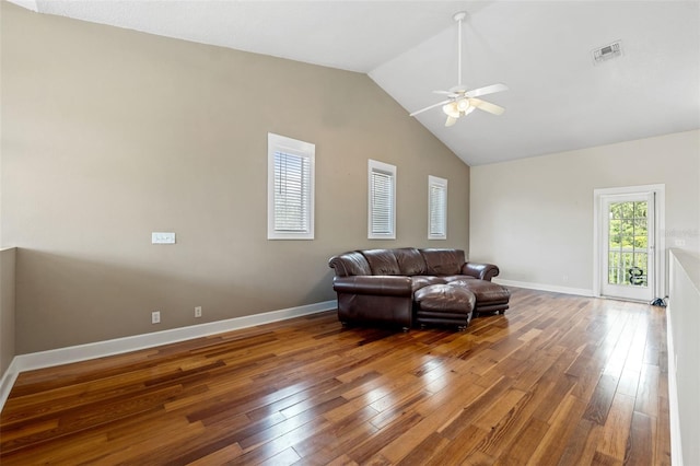 living room with ceiling fan, high vaulted ceiling, and hardwood / wood-style floors