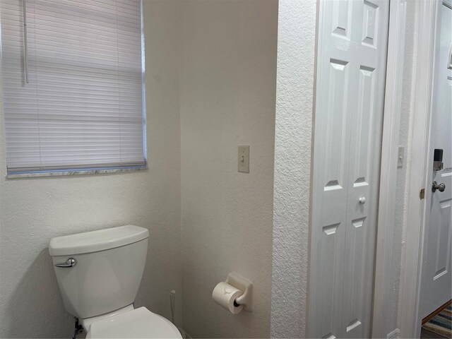 bathroom featuring toilet