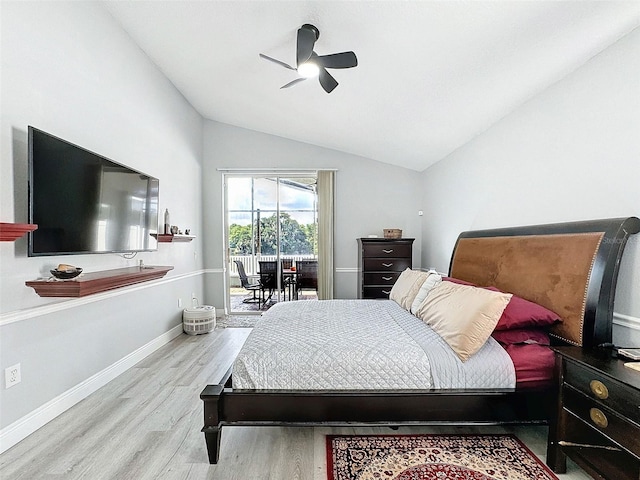 bedroom with access to exterior, vaulted ceiling, light hardwood / wood-style floors, and ceiling fan