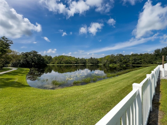 view of water feature with fence