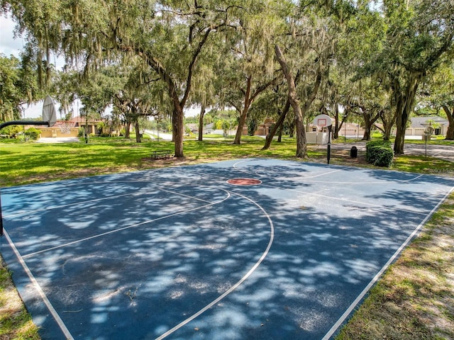 view of sport court with community basketball court and a yard