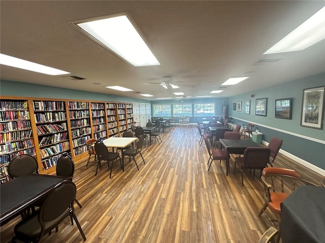 recreation room with hardwood / wood-style flooring