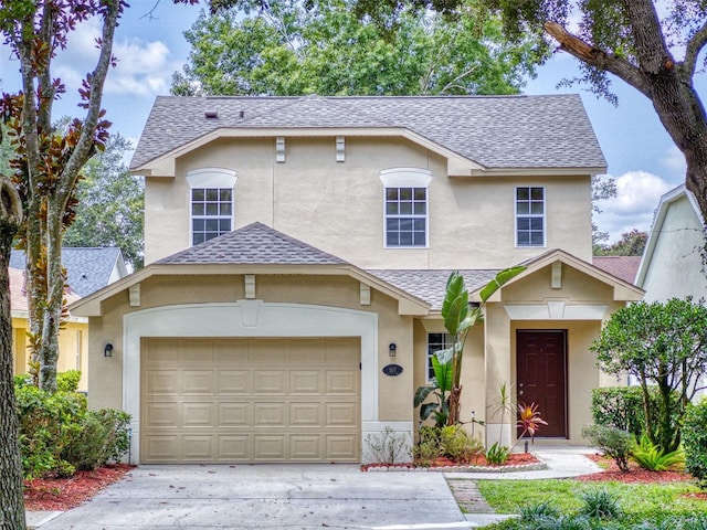 view of front of property featuring a garage