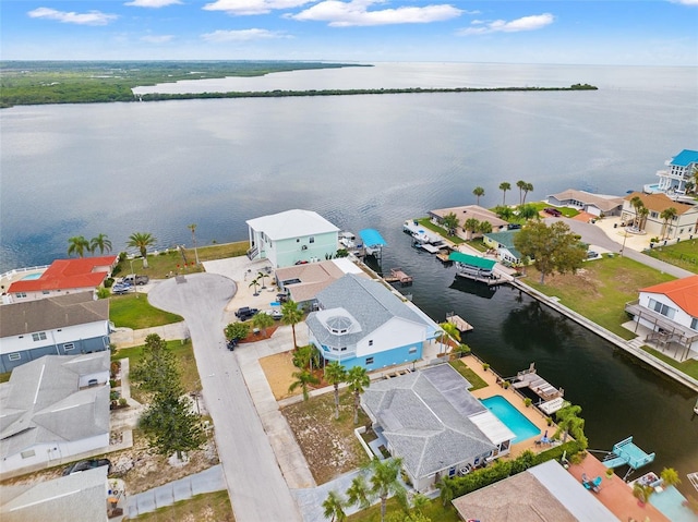 birds eye view of property featuring a water view